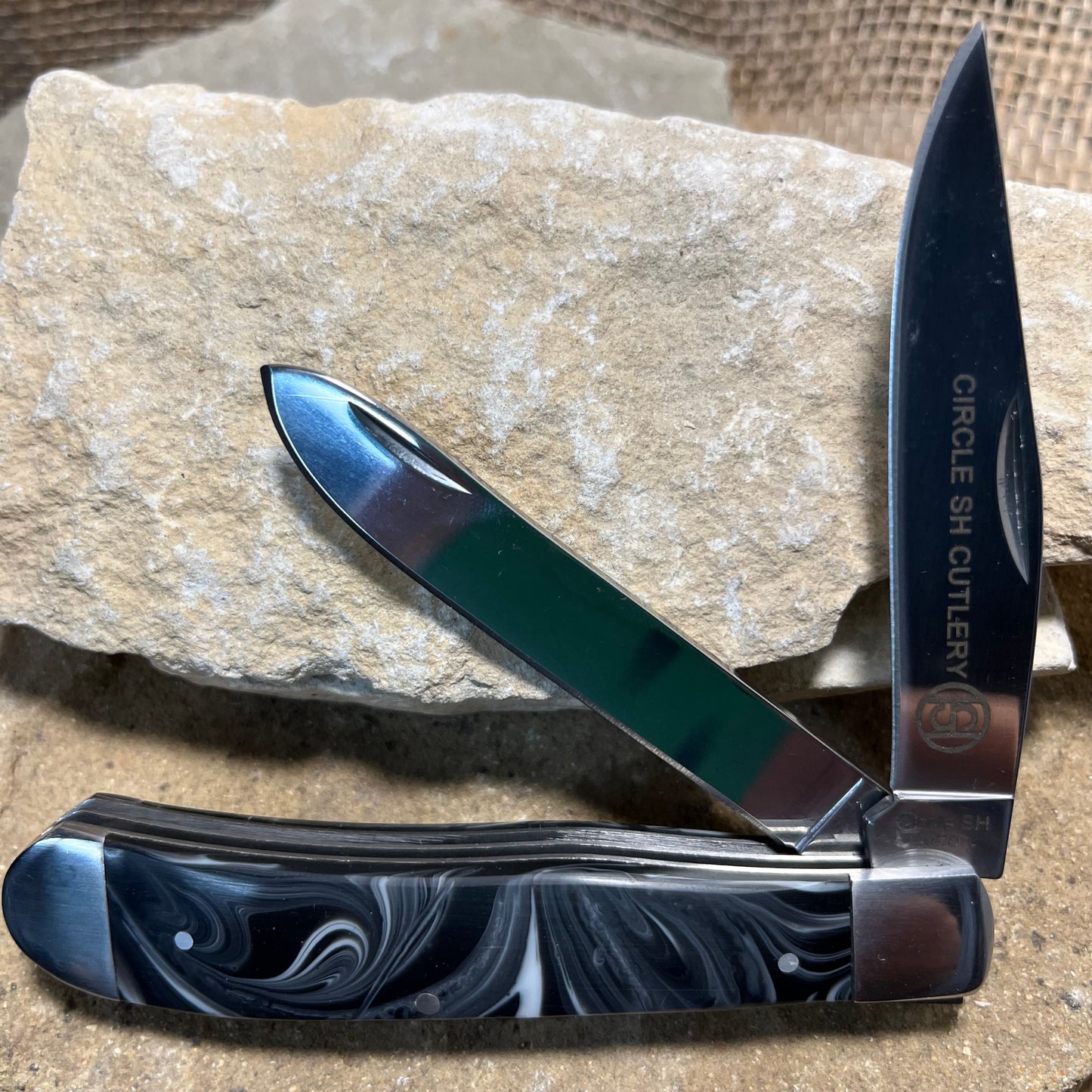 Circle SH Cutlery Marble Swirl Black Folding Trapper Knife