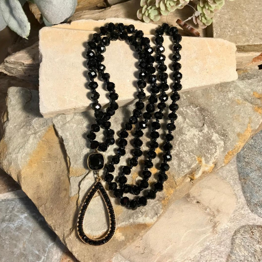 Black Bead Necklace with a Black Open Teardrop