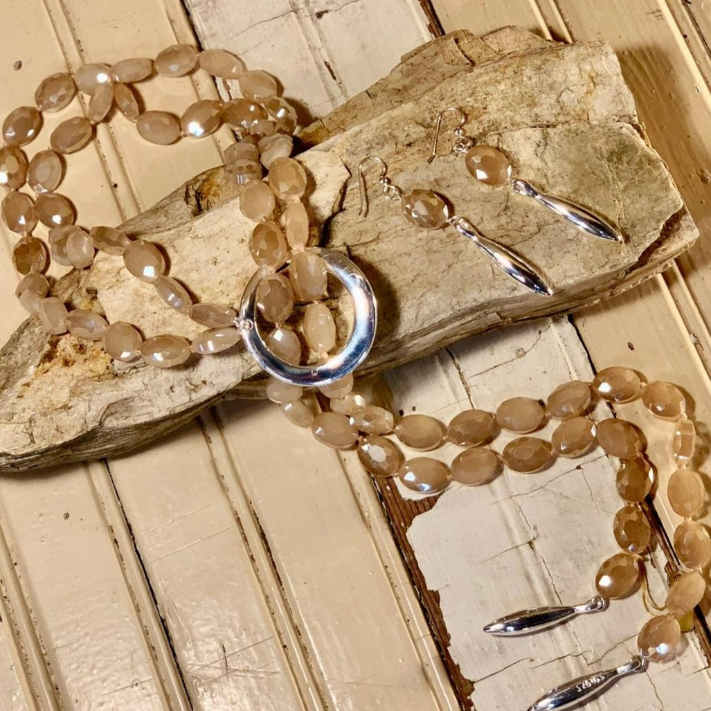 Vivid Sterling Silver Sand Oval Crystal Necklace