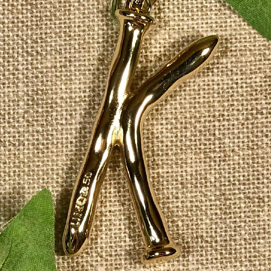 Letter Shaped Pendant in Gold inspired by the Iconic Nail