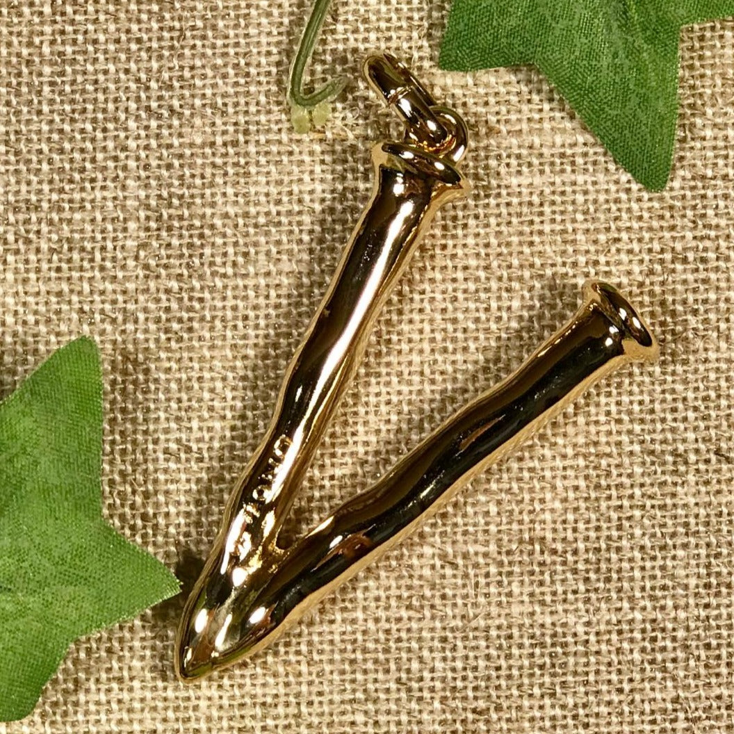 Letter Shaped Pendant in Gold inspired by the Iconic Nail