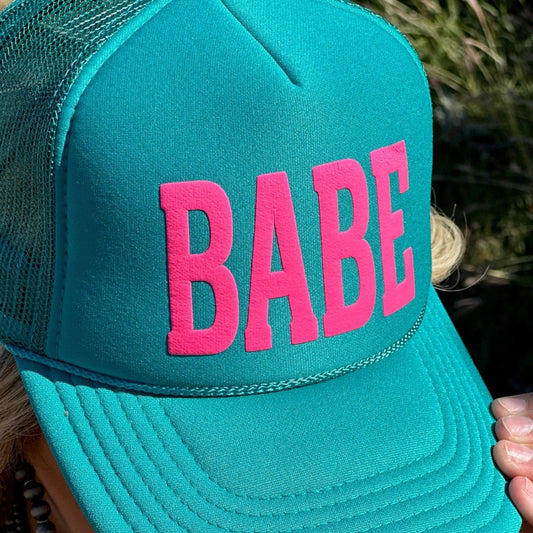 Babe in Pink Puff on Turquoise Trucker Cap