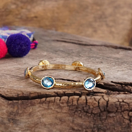 Jeweled Golden Bangle with Faceted Glass Blue Jewels