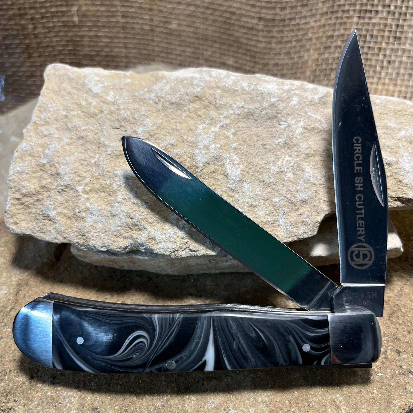 Circle SH Cutlery Marble Swirl Black Folding Trapper Knife
