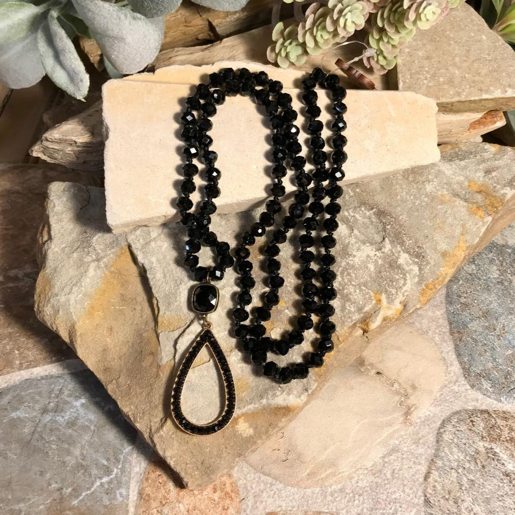 Black Bead Necklace with a Black Open Teardrop