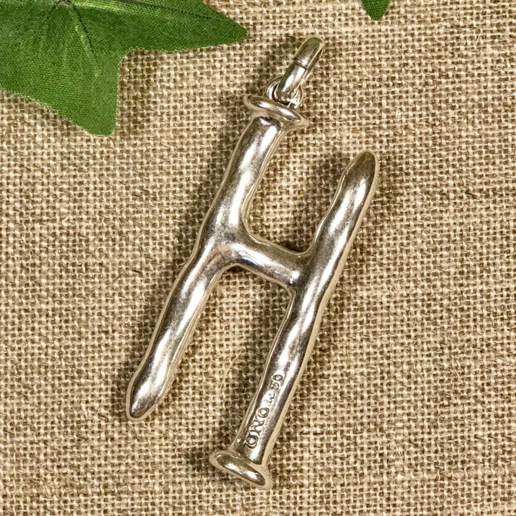 Letter Shaped Pendant in Silver inspired by the Iconic Nail
